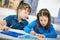 Schoolgirls learning in classroom