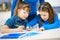 Schoolgirls learning in classroom