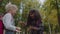 Schoolgirls playing Rock Paper Scissors. Cute student are having fun outdors. Slow Motion Shot.