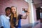 Schoolgirls taking selfie on mobile phone