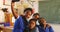 Schoolgirls taking selfies during a break at a township school 4k