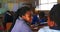 Schoolgirls talking in a lesson at a township school 4k