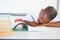 Schoolkid doing homework in classroom