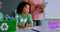 Schoolkids studying about green energy and recycle on desk  in classroom 4k