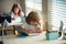 Schoolkids studying homework math during lesson at classroom, education concept, Cute schooler.