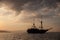 Schooner at Anchor in Tropical Pacific