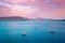 Schooner vessel ship boat in Aegean sea near Santorini island with tourists going to sunset viewpoint