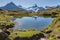 Schreckhorn, Jungfrau and Wetterhorn peaks in Bernese Alps reflecting in lake Bachalpsee, Switzerland