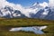 Schreckhorn reflects in Alpine pond