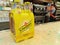 Schweppes Tonic Water, pack of four, on a bar counter