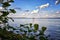 Schwerin lake with blue cloud sky and Stand Up Paddling, Germany, Mecklenburg-Vorpommern