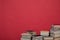 science learning library stack of books on red background