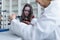 Science students doing chemical experiment in the laboratory at university. Women in science concept.