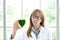 Science whit green spirit mind. Green heart in her hand on lab a