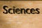 Sciences sign on a brick wall