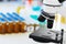 Scientific healthcare research background with microscope in medical laboratory