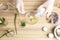 Scientist developing cosmetic product at table in laboratory, top view