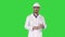 Scientist engineer in safety glasses and hard hat walking Safety concept on a Green Screen, Chroma Key.