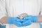 Scientist holding rat, closeup. Animal testing concept