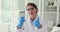 Scientist holds multichannel pipette and thumbs up