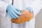 Scientist listening bread with stethoscope