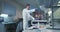 Scientist loading vials into a testing machine