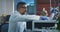 Scientist loading vials into a testing machine