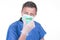 Scientist man in protective mask glove holding tube write coronavirus in covid-19 laboratory