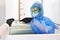 Scientist passing container with blood samles to a nurse in laboratory. Cooling box for medical samples transportation