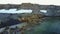 Scientist and tourists on feeding base of walruses on New Earth Vaigach Island.