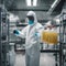 A scientist wearing a hazmat suit while handling a sample in a highly secure containment facility2