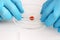 Scientist working with blood sample in laboratory, closeup