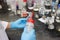 Scientist working in laboratory mixing liquids