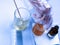 Scientist works with harmful chemicals. A laboratory worker examines biologically hazardous liquids, hazardous work, chemistry.