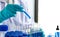 Scientists are carrying blue chemical test tubes to prepare for the determination of chemical composition and biological mass in a