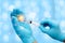 Scientists transparent medical gloves using syring Prepare a trial drug for the vaccine against Covid-19. Scientific and medical