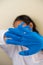 Scientists wear blue gloves and make hands unacceptable vaccine