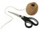 Scissors and ball of woolen thread