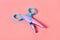 Scissors for decorative curly cutting on pink background