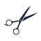 Scissors glyph icon. Haircutting shears. Cutting instrument with finger brace, tang. Hairdressing instrument.