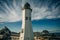 Scituate Harbor lighthouse overlooks a breakwater in Massachusetts - oct, 2022