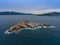 Scoglietto island with a lighthouse near the island of Elba. Portoferraio, Tuscany, Italy