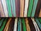 Scolor paint on wood material green white yellow blue brown background wallpaper