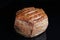 Scone mini bread on black reflective studio background. Isolated black shiny mirror mirrored background for every concept.