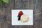 Scones with strawberries, blueberry and mulberry on wooden table