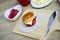 Scones with strawberry jam and butter dessert food on wooden table backgrounds