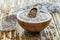 Scoop with buckwheat in a bowl with buckwheat flour.