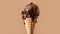 Scoop of crave-worthy dark rich chocolate ice cream with velvety texture in waffle cone with melting dripping, chocolate sauce on
