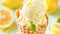 Scoop of creamy lemon ice cream in waffle cone with citrus fruits. Delicious refreshing dessert