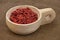 Scoop of dried Tibetan goji berries (wolfberries)